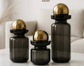 Trans black vase with golden balls set of 3